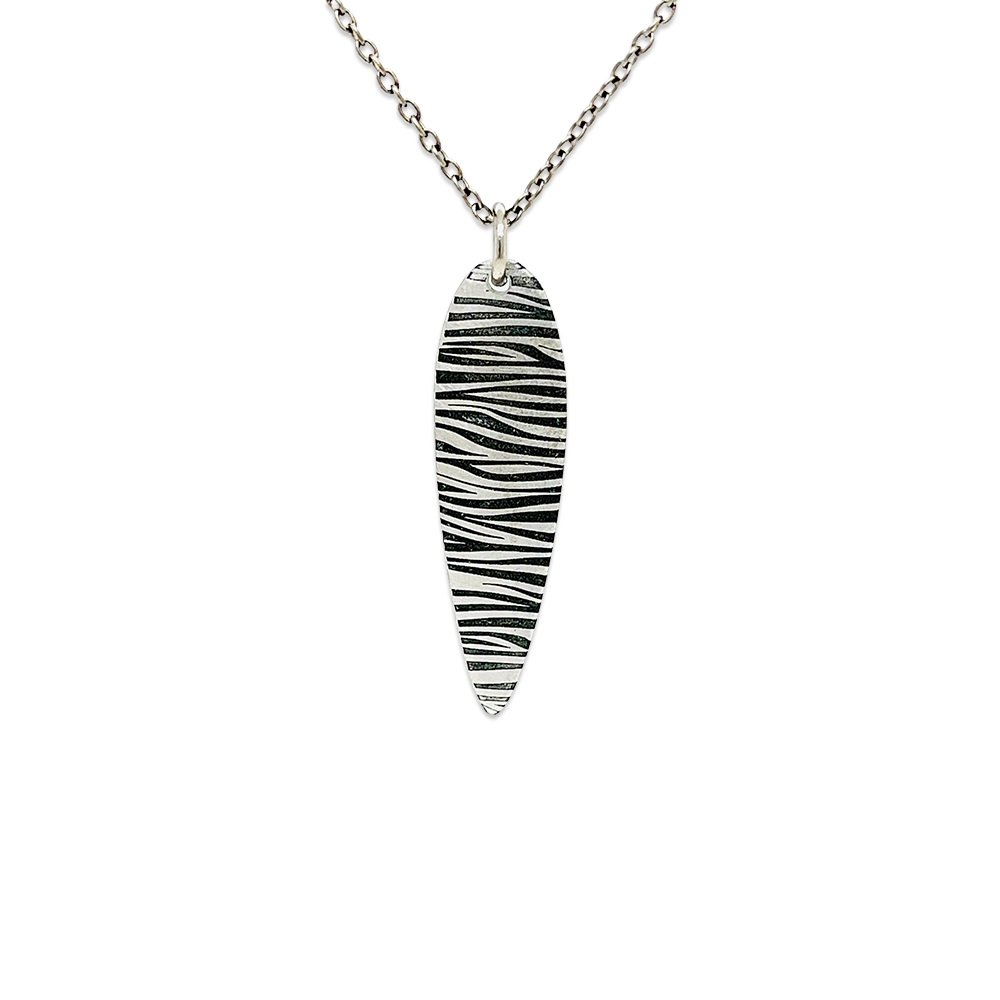 ZEBRA PRINT LONG PENDANT