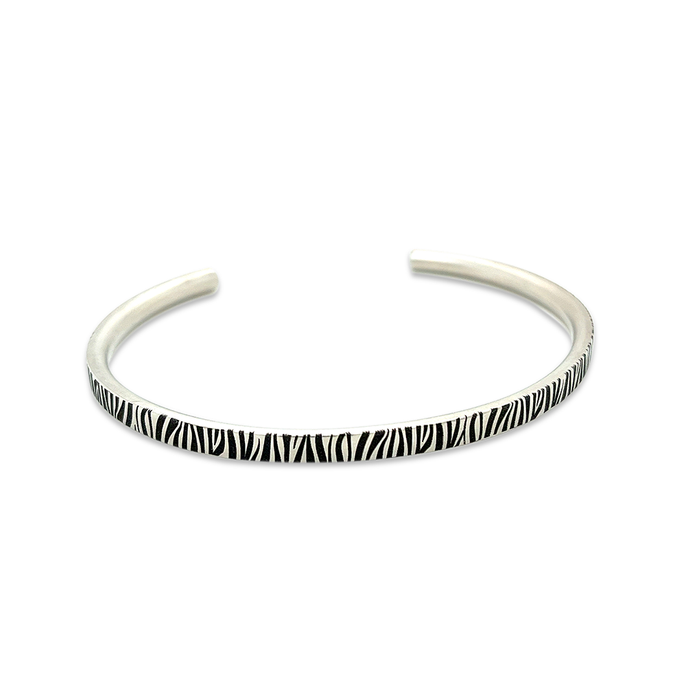 Zebra Slim Torc Bangle